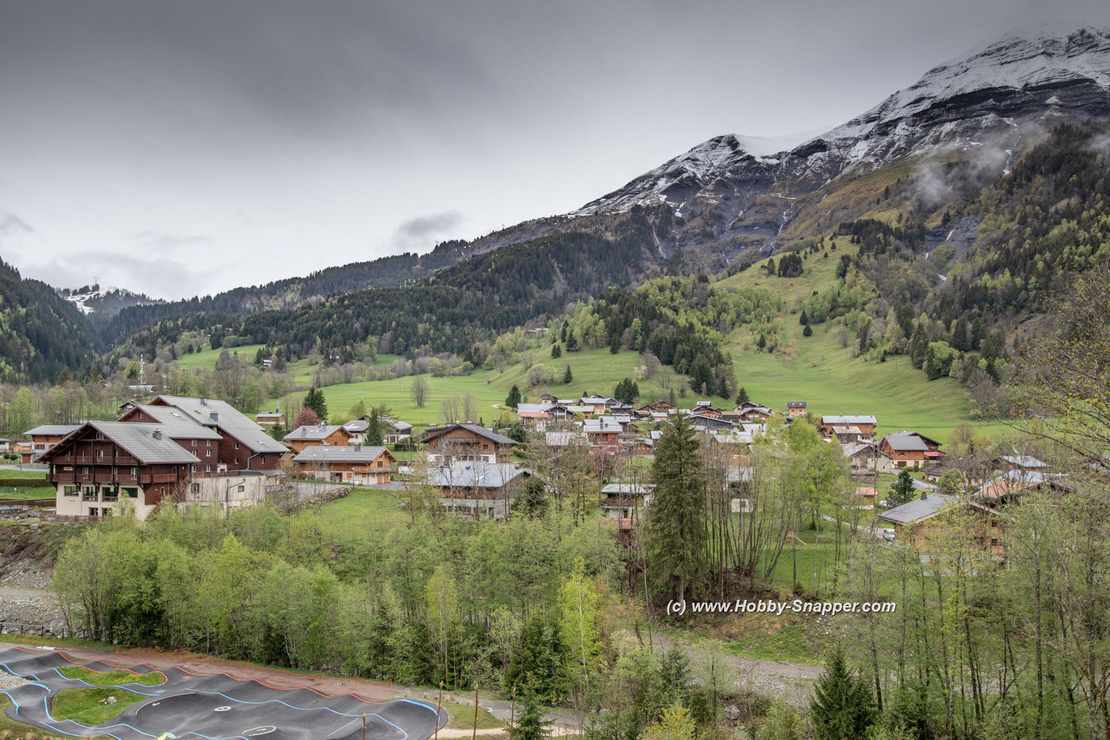 Photo Image Of: Clouds over the village
