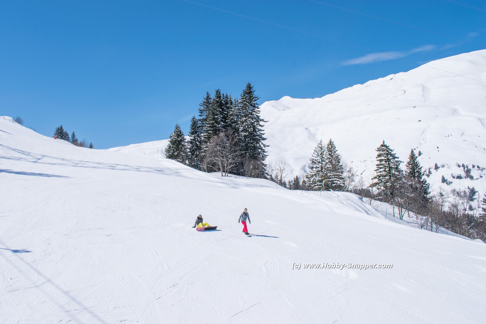Photo Image Of: Snowboarders on the slopes