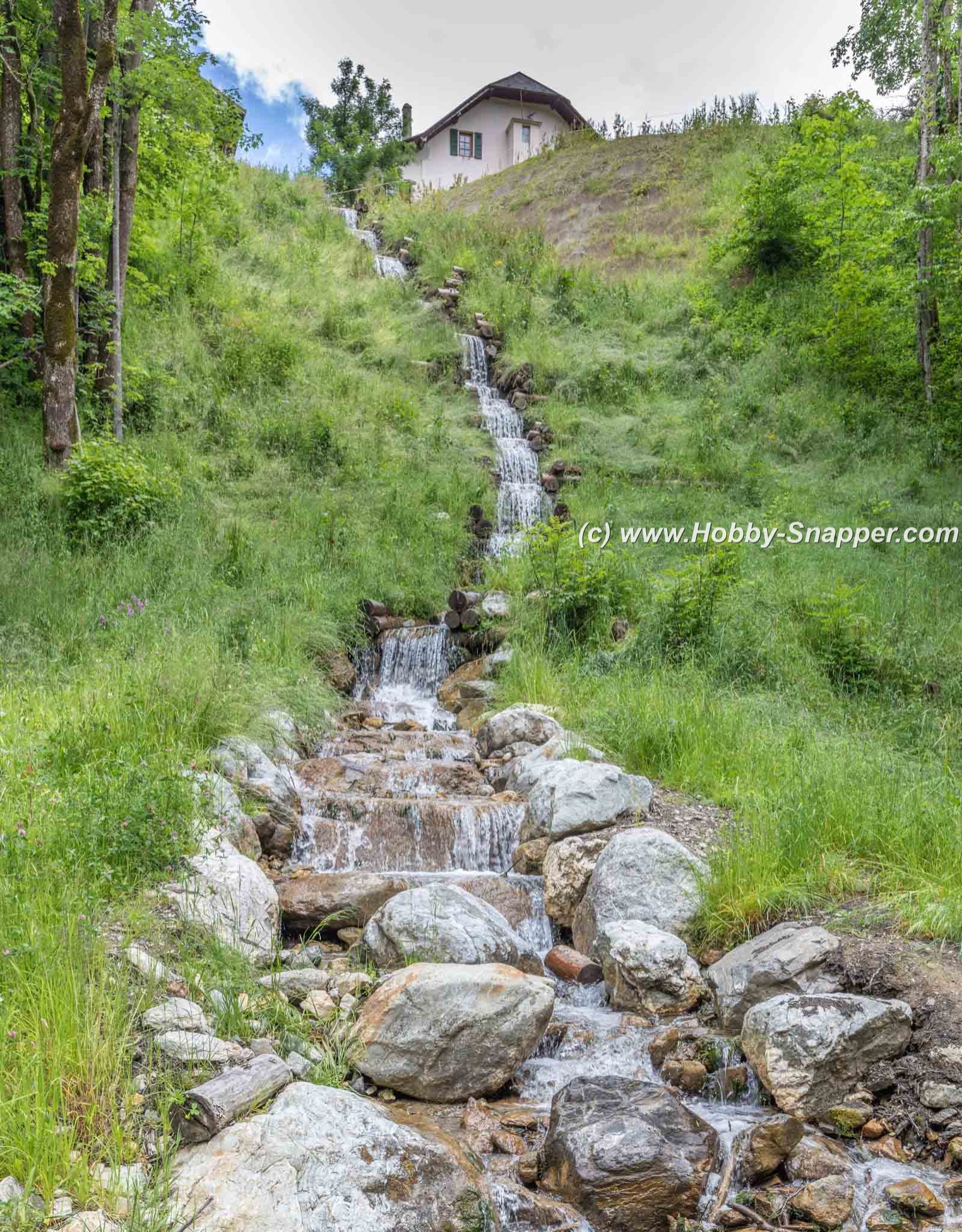 Photo Image Of: The village waterfall feature